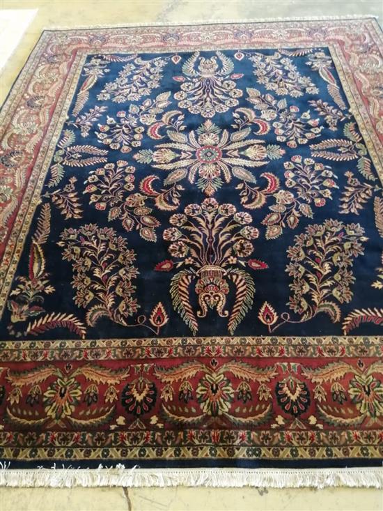 An Indian Tabriz blue carpet, 300 x 250cm